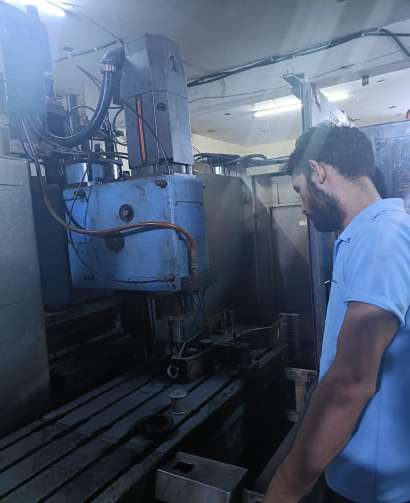 Operator setting up a machine